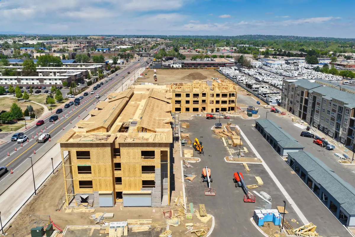 Aerial drone photo documenting vertical construction progress on a Denver job site