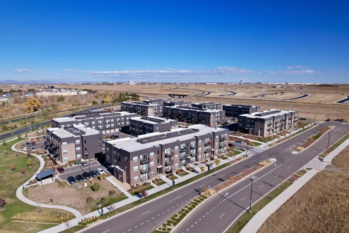 Drone photo of multi-family apartment building and parking in Colorado