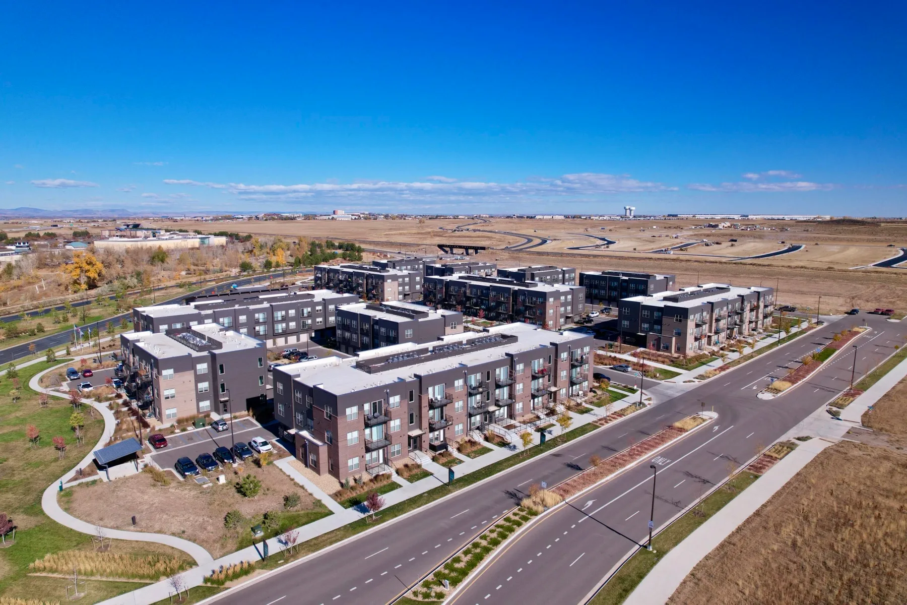 Drone photo of multi-family apartment building and parking in Colorado