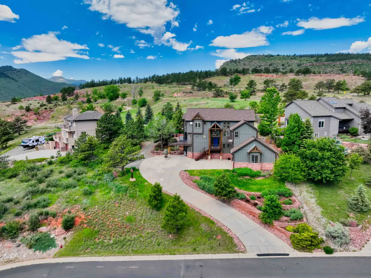 Drone photo of a Colorado residential property and surrounding homes