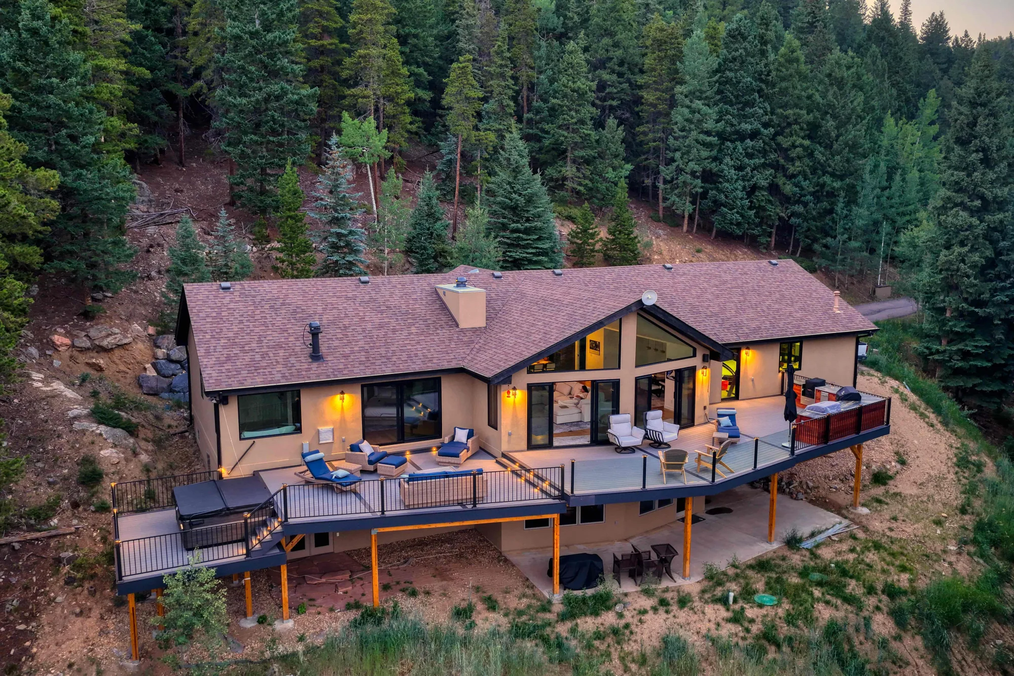 Golden real estate drone photography at twilight showing a Colorado property setting