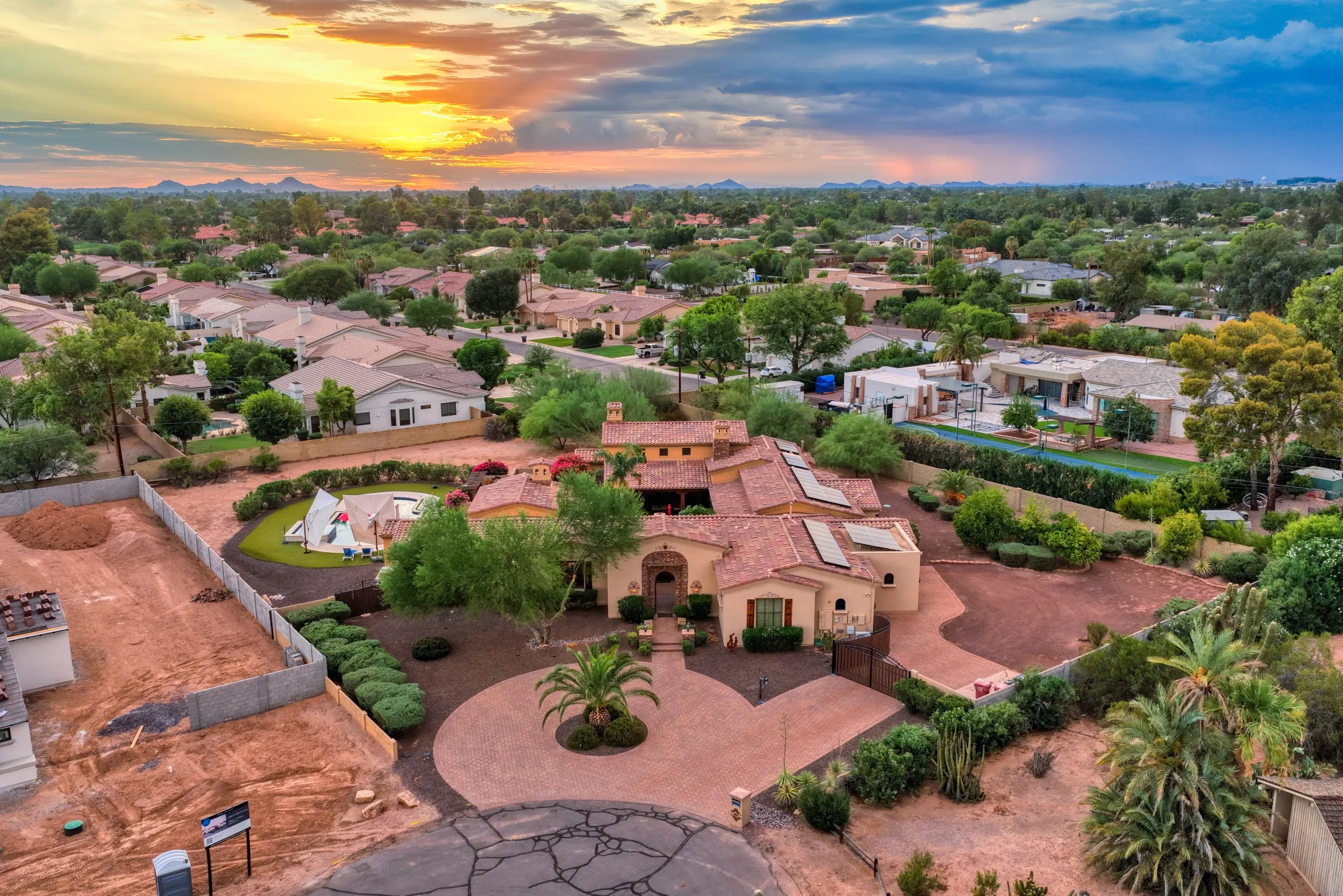 Twilight real estate drone photo showing a Colorado residential property