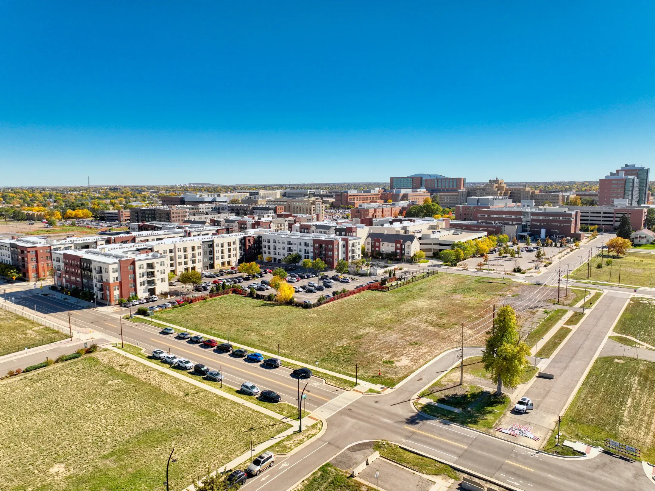 Aerial vacant land listing photo near Aurora Colorado with open terrain and access context